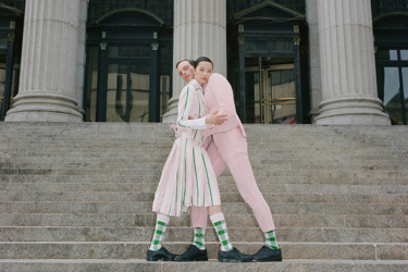 xiao and rocky wearing pink and green in new york.