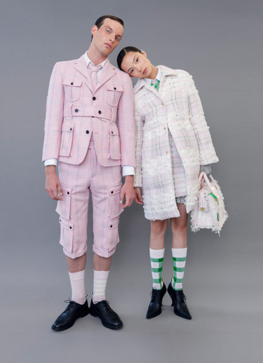 rocky and xiao wearing pink and green in new york.